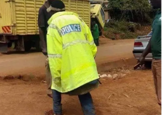 It's Never a dull Moment in KENYA,Did this guy steal a police jacket? –(PHOTO)
