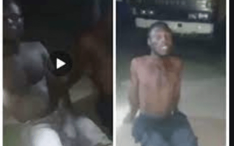 SHAME as two men are caught drilling each other in a parking lot (VIDEO)