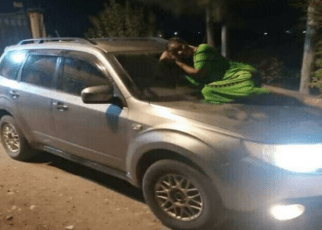 Lady spends a night at car windscreen waiting for her husband and side chick to come out