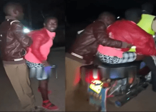 Drama as a man lifts a lady and puts her on a motorbike after buying her drinks and refused to spend the night with him as agreed